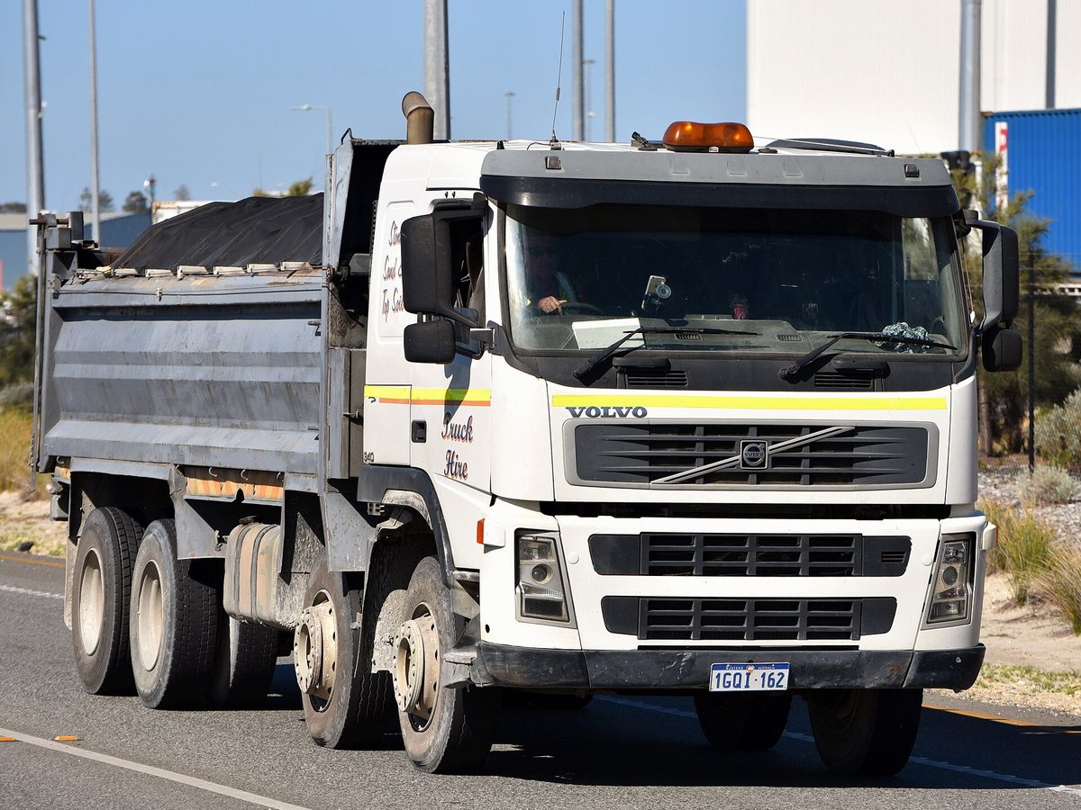 Volvo heavy tipper truck on the road