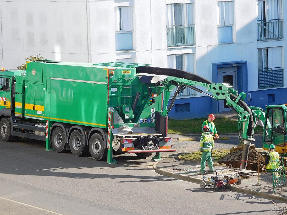 Vacuum excavation truck on a residential street