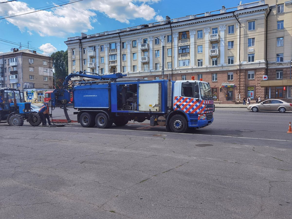 Vacuum tanker truck working at the kerbside